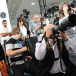 Periodistes en una roda de premsa (UNClimateChange Flickr)